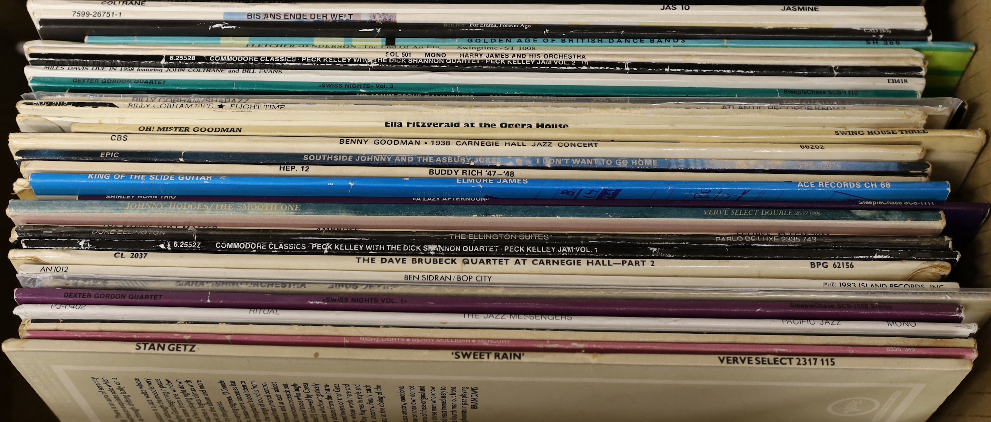 Fifty mainly jazz and pop LPs, including Stan Getz, Dexter Gordon, Dave Brubeck, Buddy Rich, Benny Goodman, Ella Fitzgerald, Art Tatum, John Coltrane, ABBA, David Bowie, Ry Cooder, etc.